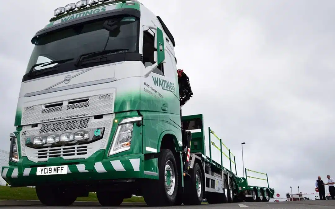 VOLVO FH WITH F545 CRANE , CHEESE WEDGE BODY AND DRAWBAR TRAILER.