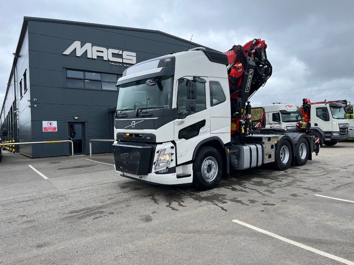 Image of a 2024 Volvo tractor unit with crane from Mac's Truck Sales